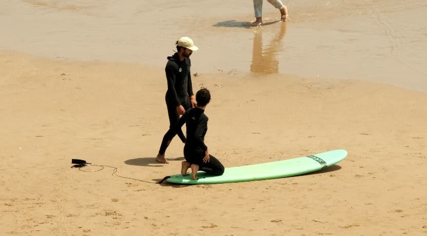 Surf coaching in Imsouane with a local instructor leading the session